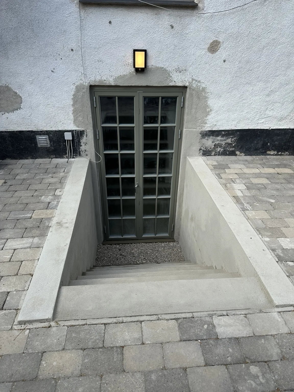 Valby, Denmark – from small basement window to double doors and direct exit